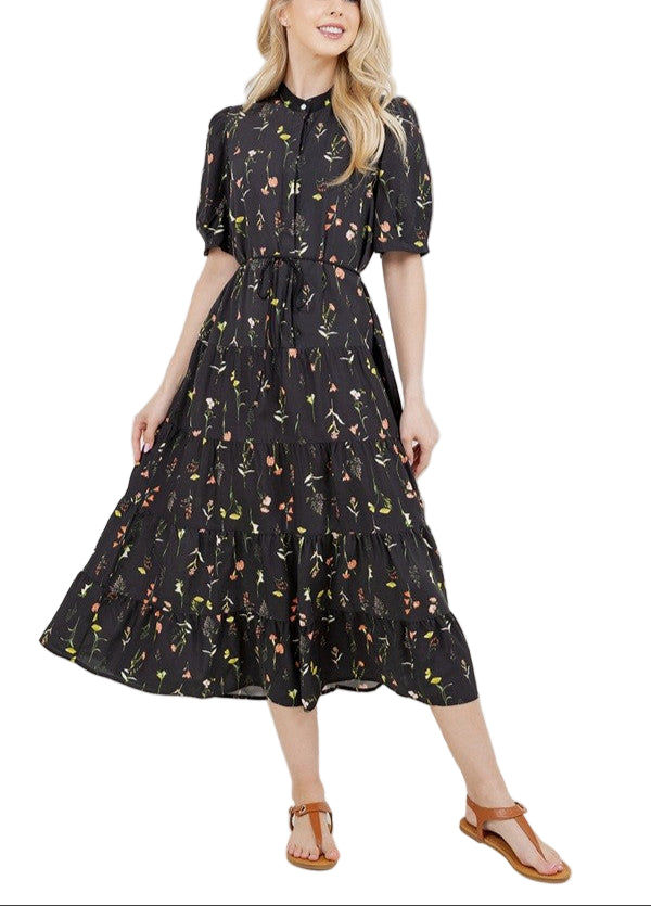 A beautiful floral dress with short sleeves and a tie waist.