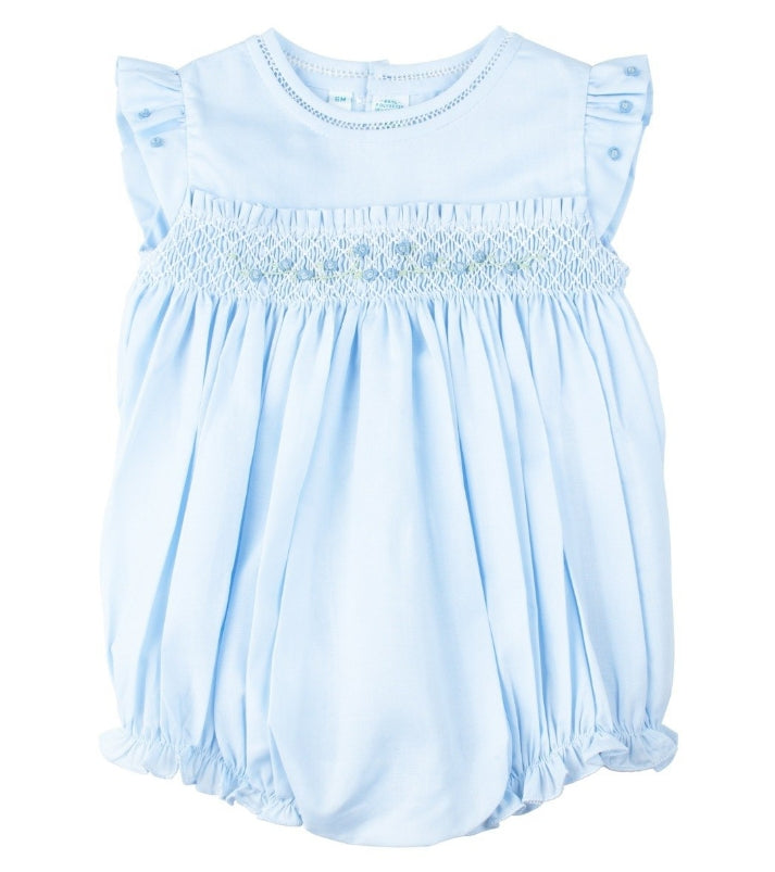 Roses, ruffles, and hand made smocking - what more could you ask for? This beautiful baby bubble from our Rose Garden Collection is as sweet as they come, perfect to add to your little girl's heirloom layette set. Charming rosebud bullions adorn the fly sleeves and smocked bodice, edged with a bit of dainty ruffles. Delicate fagoting lines the neck for an added touch of class. The perfect Easter outfit, Holiday outfit, or Baby's first portrait outfit.