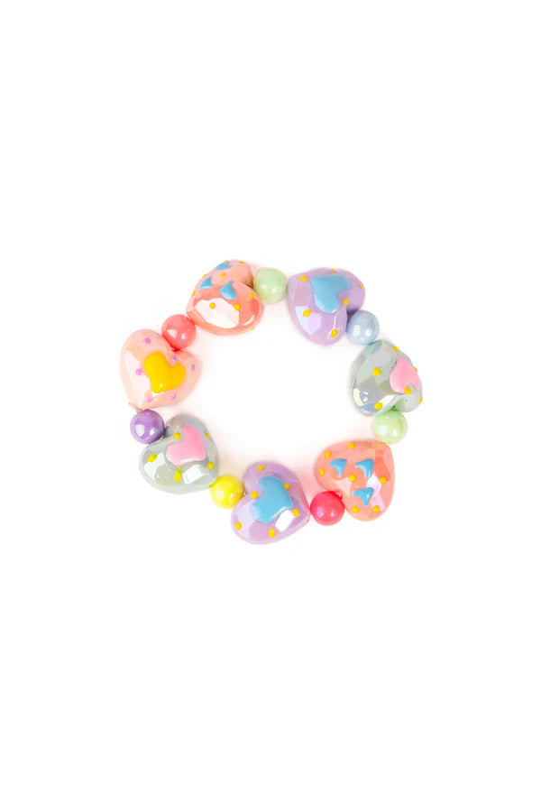 Spread love in style with our new Decorated Love Bracelet! This charming chunky bracelet features a series of colorful hearts, each adorned with a unique design. The hearts are beautifully crafted in soft shades of purple, light peach, light green, and light pink, making this bracelet a perfect mix of fun and elegance. A sweet accessory for any occasion, it’s sure to capture hearts with its vibrant colors and eye-catching details!