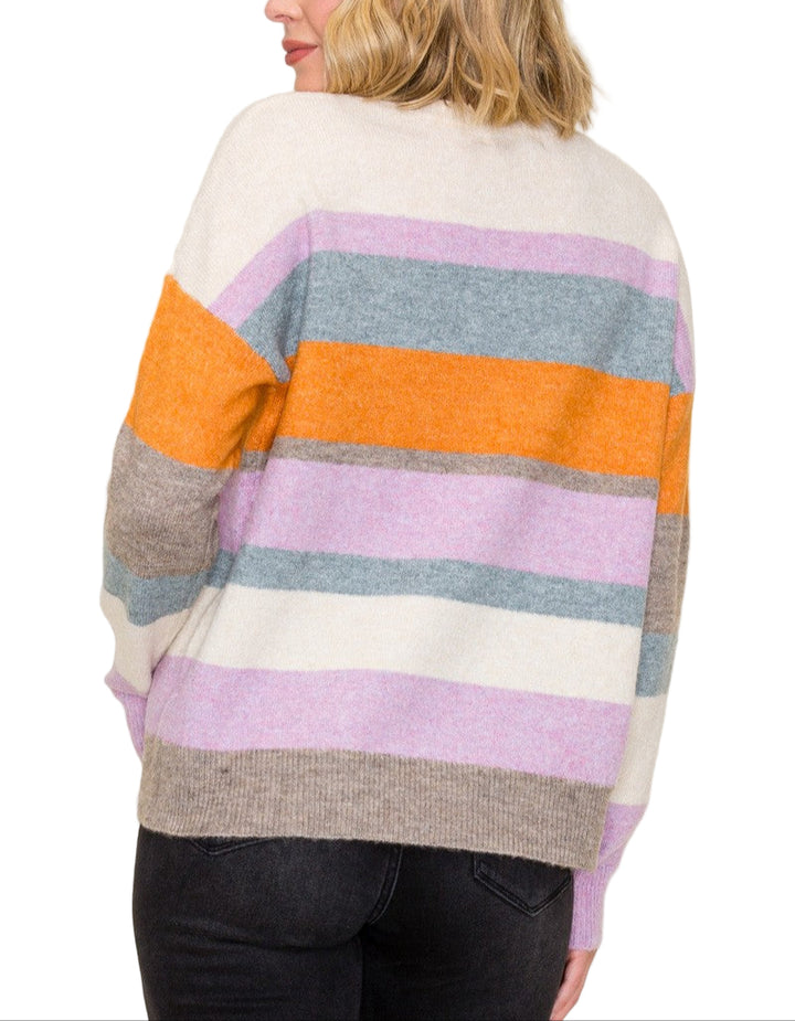 Add a splash of fun to your wardrobe with the Connie Multi Color Sweater. This cozy crew neck combines vibrant hues for a playful look that brightens up any outfit. Perfect for chilly days, it keeps you comfy while adding a cheerful twist to your style.