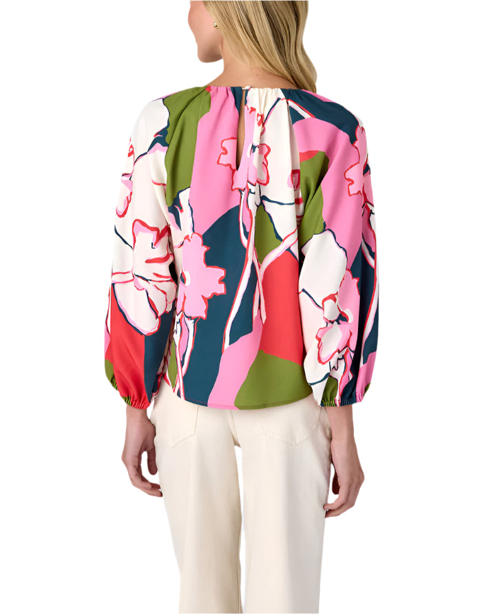 We can’t get enough of the Claudia Blouse! This stylish top features a crew neckline and voluminous ¾-length sleeves. Perfect for dressing up or down, it’s a versatile staple you’ll reach for again and again.