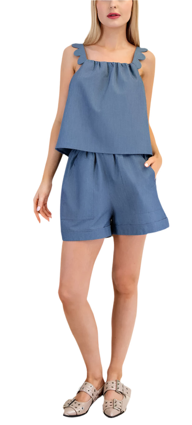 Flirty and fun, the Elsa Short Set is perfect for a day of adventure. The scalloped tank top and high waisted shorts add a touch of whimsy to your summer wardrobe.&nbsp;