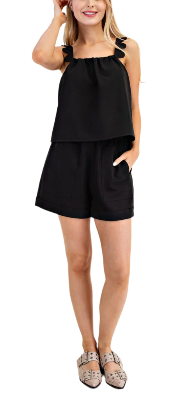 Flirty and fun, the Elsa Short Set is perfect for a day of adventure. The scalloped tank top and high waisted shorts add a touch of whimsy to your summer wardrobe.&nbsp;
