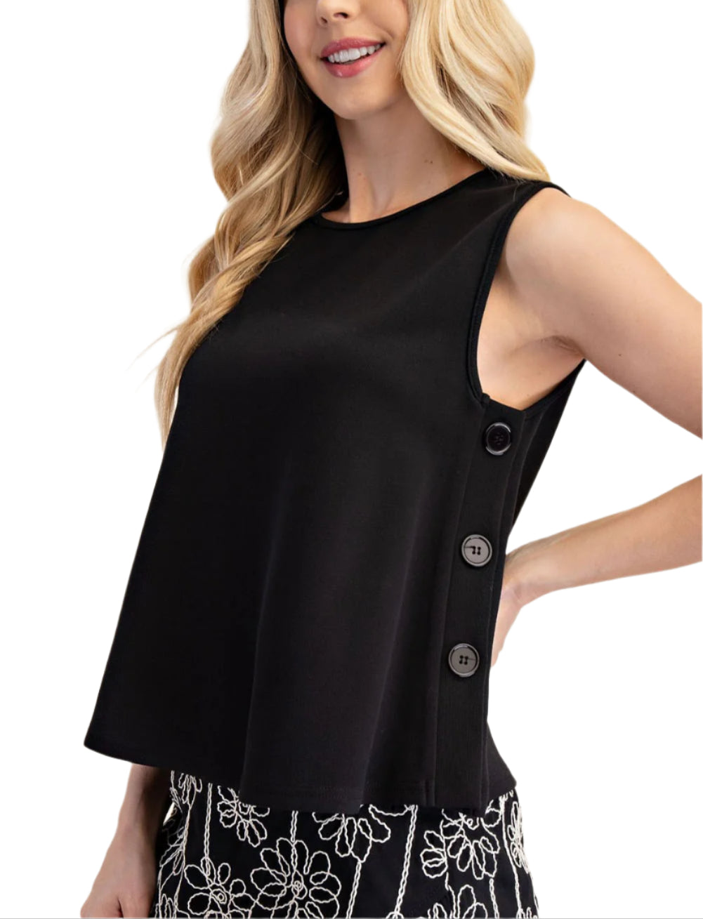 Meet Josie, the sleeveless top with side buttons for added flare. This top is perfect for any occasion.&nbsp;