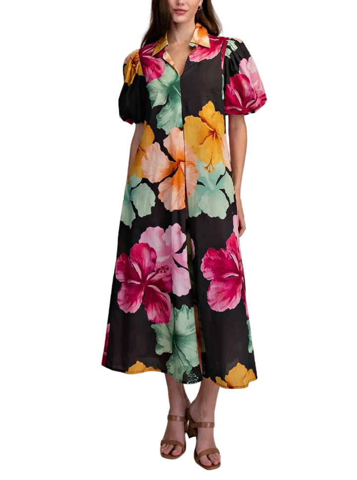 The Susan dress combines timeless elegance with modern flair. Featuring a flattering V-neckline, voluminous puff sleeves, and a structured collar, this midi silhouette drapes beautifully with pleated detailing throughout.&amp;nbsp;