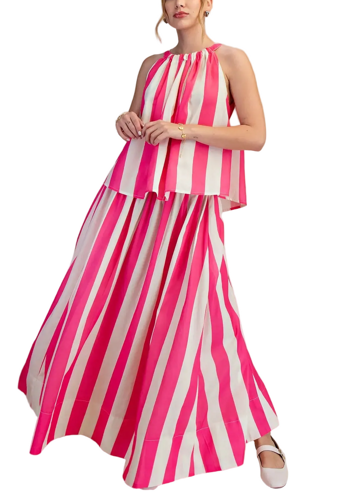 Elevate your everyday style with this effortless two-piece set! The stripe flare maxi skirt brings movement and flair to your wardrobe, while the round neck sleeveless top keeps things cool and comfortable. Perfect for casual outings, weekend adventures, or those days when you want to look put-together without trying too hard. Mix, match, and make it your own—this dynamic duo works solo or paired together for maximum versatility and fun!