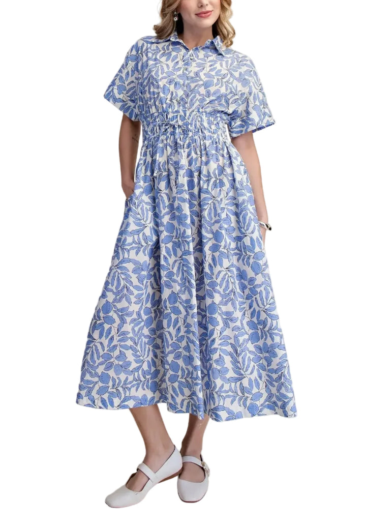 Embrace effortless spring summer style with this charming blue, pink and white floral print midi dress. Designed for comfort and chic versatility, this casual dress features a flattering cinched waist that creates a beautiful silhouette, accentuated by a gentle drawstring. The classic collared neckline and short sleeves offer a polished yet relaxed feel, perfect for warm-weather outings. Practical side pockets add a touch of everyday functionality, while the lightweight, breathable fabric ensures you stay c