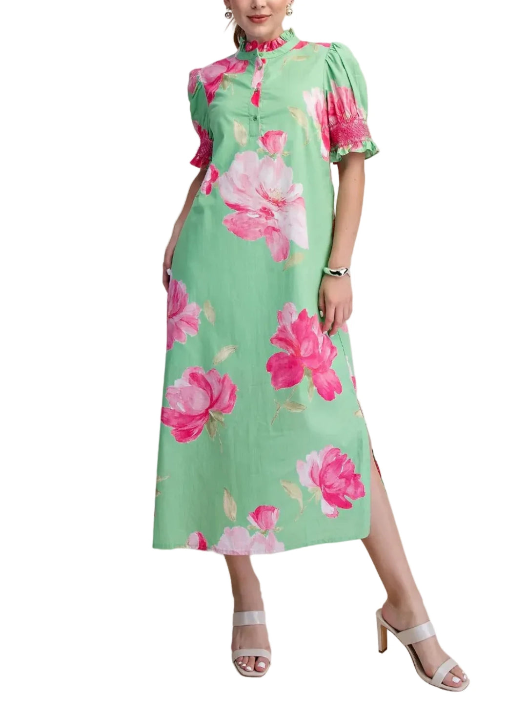 Embrace effortless charm with this stunning floral print midi dress. Designed for the modern woman, this casual dress features a flattering silhouette with delicate puff sleeves and a chic high neckline. The vibrant pink floral pattern pops against a crisp white background, making it a perfect choice for sunny days and garden parties. Crafted from a lightweight fabric, this dress offers comfort and style for any occasion. Its flowy design and midi length create a graceful movement, while the short sleeves a