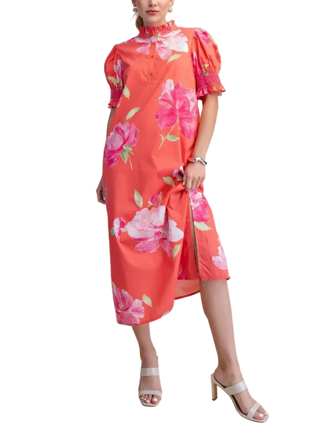Embrace effortless charm with this stunning floral print midi dress. Designed for the modern woman, this casual dress features a flattering silhouette with delicate puff sleeves and a chic high neckline. The vibrant pink floral pattern pops against a crisp white background, making it a perfect choice for sunny days and garden parties. Crafted from a lightweight fabric, this dress offers comfort and style for any occasion. Its flowy design and midi length create a graceful movement, while the short sleeves a
