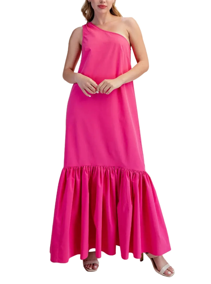Make a striking entrance with this effortless yet architectural statement piece. Designed in a vibrant color, this maxi dress features a chic, asymmetrical one-shoulder neckline that drapes elegantly into a relaxed, flowing bodice. The standout feature is the dramatic, drop-waist ruffled hem, which adds stunning volume and movement as you walk. Whether you are attending a summer wedding, a resort getaway, or a daytime garden party, this dress perfectly balances high-fashion flair with all-day comfort.