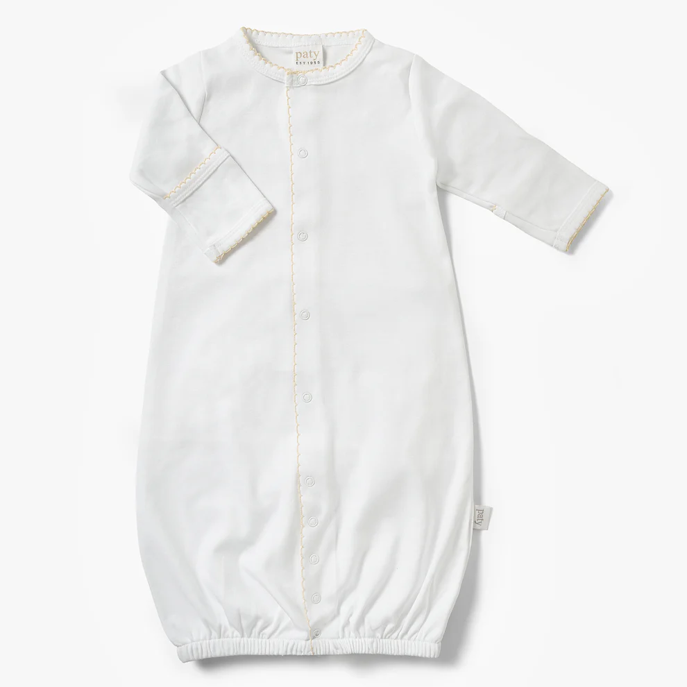 Designed with a gentle elasticized hem for easy diaper changes, this converter gown offers everyday comfort and effortless functionality. Built-in fold-over cuffs help protect delicate skin from scratches, making it a thoughtful take home outfit or cherished baby shower gift.&amp;nbsp; oatmeal 
