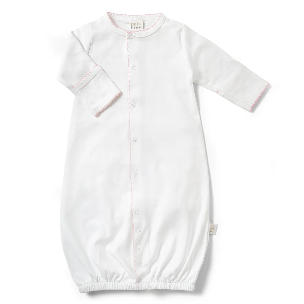 Designed with a gentle elasticized hem for easy diaper changes, this converter gown offers everyday comfort and effortless functionality. Built-in fold-over cuffs help protect delicate skin from scratches, making it a thoughtful take home outfit or cherished baby shower gift.&amp;nbsp; pink