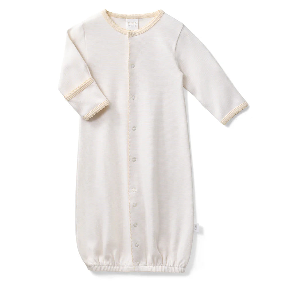 This versatile style conveniently converts from a gown to a romper as baby grows. Designed with a gentle elasticized hem for easy diaper changes, it offers everyday comfort and effortless functionality. Built in fold-over cuffs help protect delicate skin from scratches, making it a thoughtful take home outfit or cherished baby shower gift.
