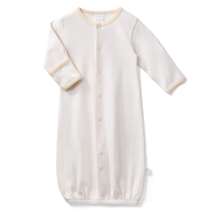 This versatile style conveniently converts from a gown to a romper as baby grows. Designed with a gentle elasticized hem for easy diaper changes, it offers everyday comfort and effortless functionality. Built in fold-over cuffs help protect delicate skin from scratches, making it a thoughtful take home outfit or cherished baby shower gift.