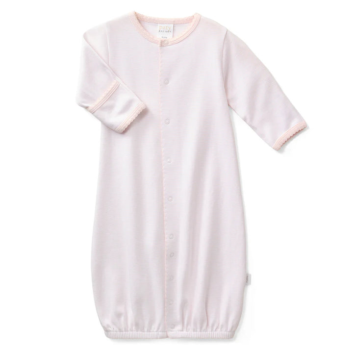 This versatile style conveniently converts from a gown to a romper as baby grows. Designed with a gentle elasticized hem for easy diaper changes, it offers everyday comfort and effortless functionality. Built in fold-over cuffs help protect delicate skin from scratches, making it a thoughtful take home outfit or cherished baby shower gift.