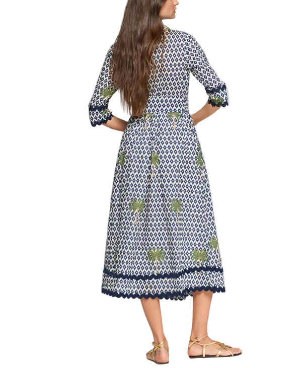 Escape to paradise with this stunning navy midi dress featuring an eye-catching ikat palmeras print. The front button-up design offers effortless style and versatility, while the included belt cinches your silhouette for a flattering, polished look. Perfect for everything from casual outings to elevated weekend getaways, this Vilagallo piece brings tropical-inspired charm and timeless elegance to your wardrobe. Dress it up or down—this beauty does it all.