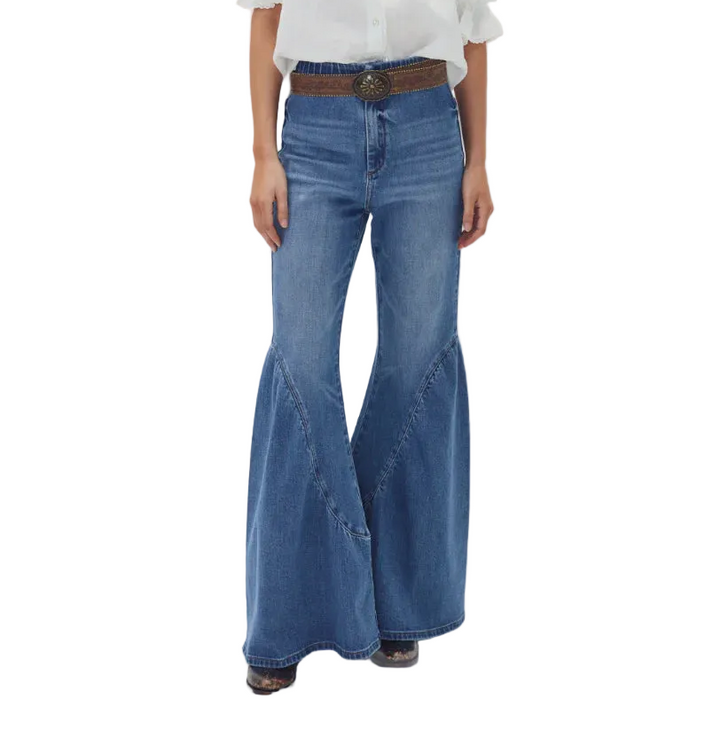 A modern take on boho flair, the Gypsy Denim Pants feature a flattering high-waisted fit with a wide flared leg for a true gypsy silhouette. Crafted in a super-soft washed denim blend with a touch of spandex for comfort, they include classic back pockets and a clean waistband. Free-spirited style with a vintage soul.