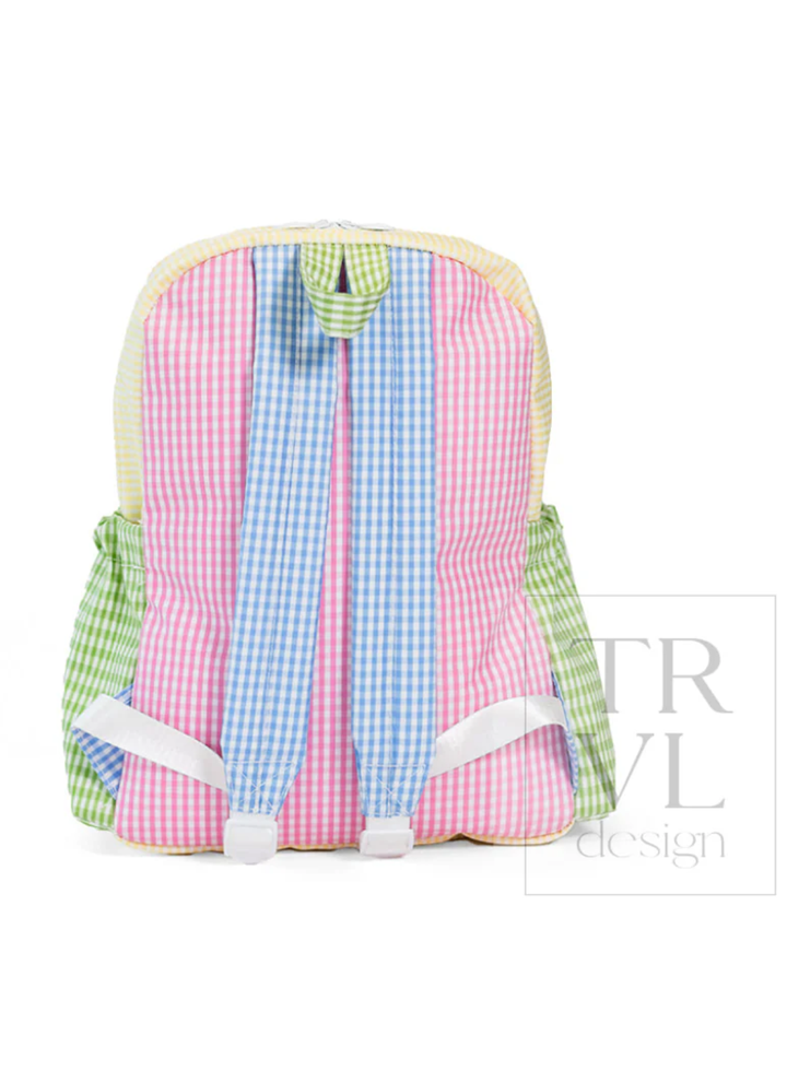 Backpack with pink and blue checkered pattern on a white background