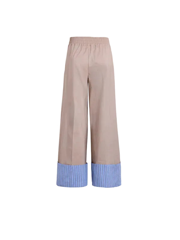 Elevate your everyday style with these chic beige trousers featuring eye-catching striped cuffs that add a dash of personality to any outfit. Crafted by Vilagallo, these pants blend timeless sophistication with a fun, unexpected twist at the hem. Perfect for dressing up casual looks or adding visual interest to your professional wardrobe. The tailored fit and quality construction ensure comfort and durability, making them a versatile staple you'll reach for again and again.