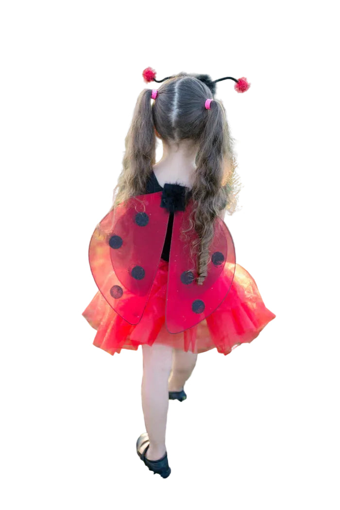 She's the little bug you won't mind buzzing around the house! Our Ladybug 3 piece set includes a tutu skirt, wings and headband. The red tutu skirt features three tiers of soft tricot and sparkle tulle. Springy antennae headband tops this Ladybug outfit. Finish with the red-and-black polka dot 4 piece wings and she's ready to take to the sky!