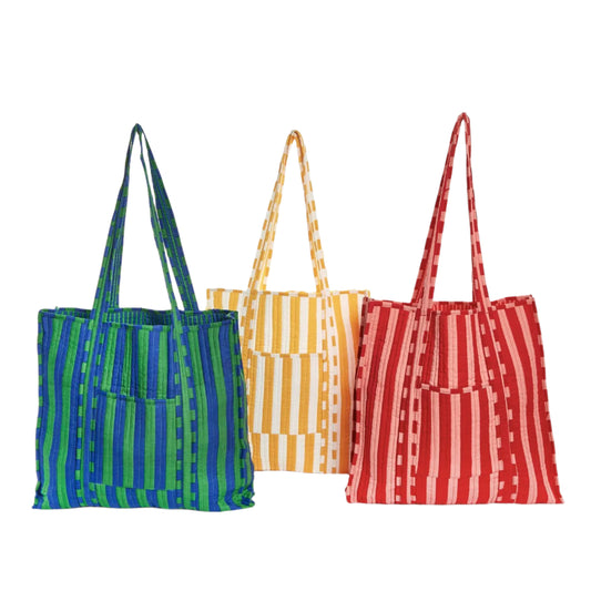 Step into a world of Southern charm with our 2Chic True Tones Printed Cotton Quilted Reversible Tote Bag. Crafted from the finest cotton, this tote exudes elegance and functionality. The reversible design allows you to switch up your look effortlessly, while the coordinating mini striped print lining adds a touch of whimsy.