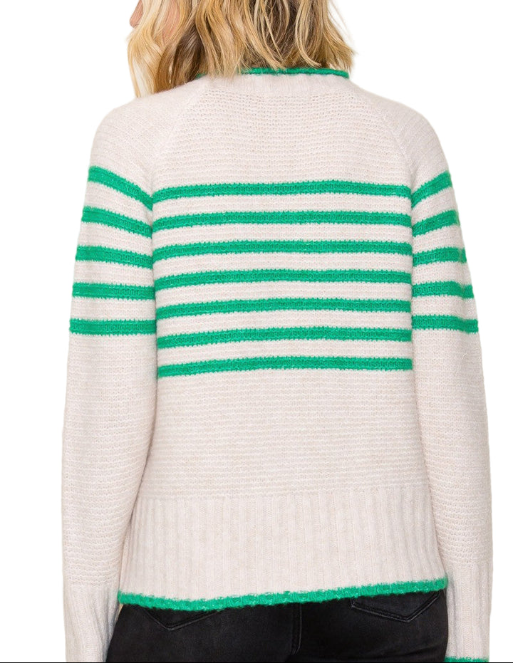Bring a pop of fun to your wardrobe with the Polly Striped Sweater! This cozy crew neck features cheerful stripes that brighten any day while keeping you snug. Perfect for layering or wearing solo, it’s the playful twist your outfit has been waiting for.