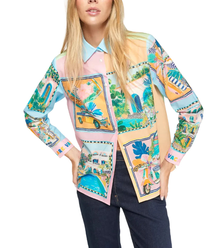 Woman wearing a colorful patterned shirt with a neutral background