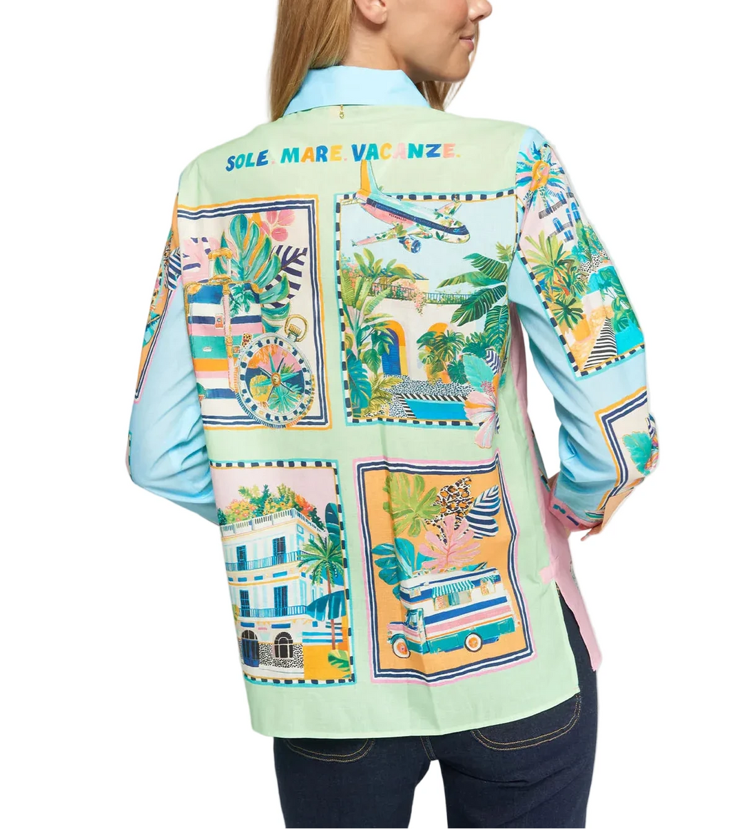 Woman wearing a colorful patterned top with &