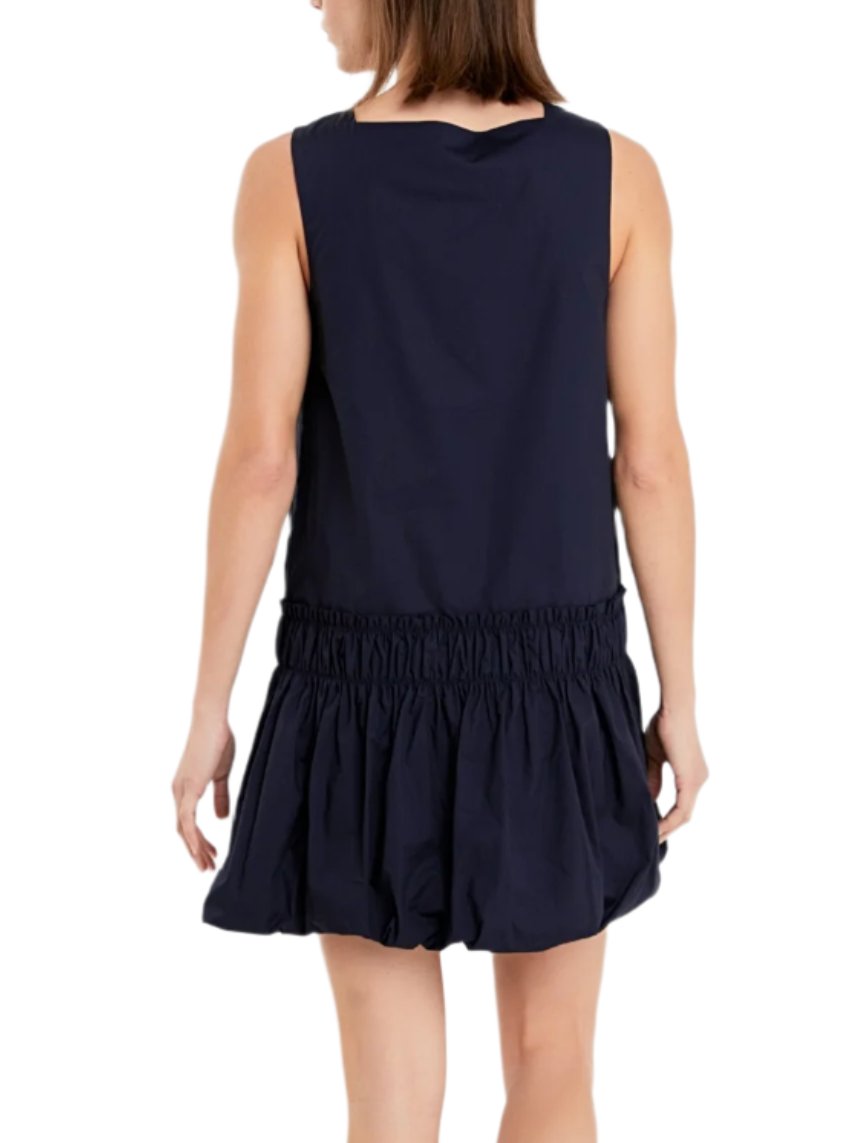  Square neckline - Sleeveless - Bottom shirring with ruffle details - Mini length