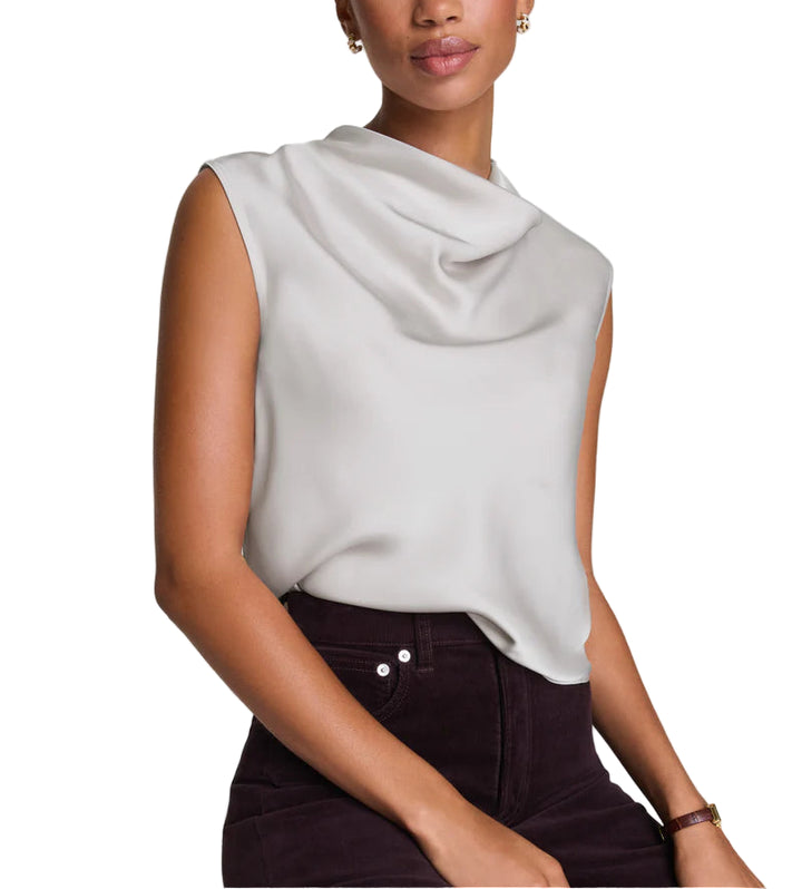 Our SPANX® Silky Smooth Cowl Neck Sleeveless Top is a timeless, relaxed-yet-elevated sleeveless blouse with light stretch for all-day elegance. Easy to wear and even easier to care for, this machine washable top pairs perfectly with everything from your favorite jeans to PerfectFit ponte pants.