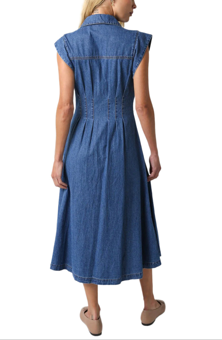 Our Blair Denim Dress features a v-neck and a button down
