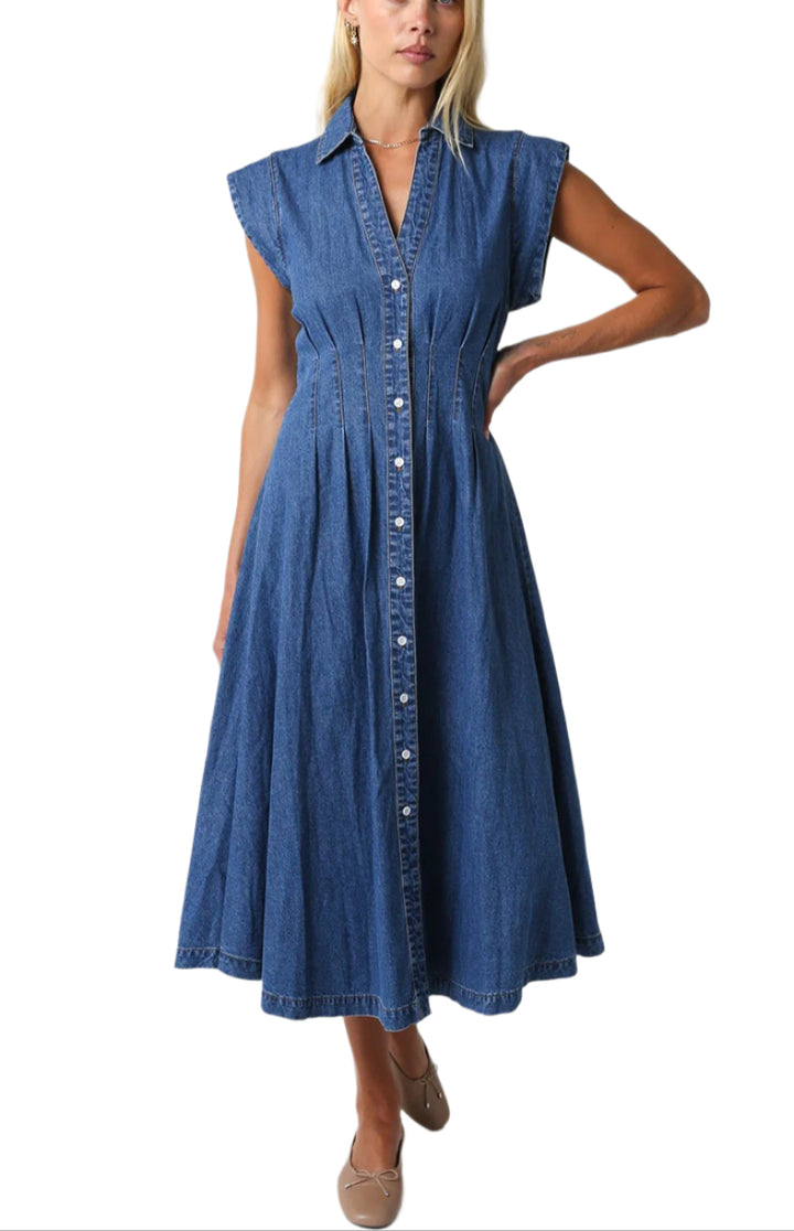Our Blair Denim Dress features a v-neck and a button down

