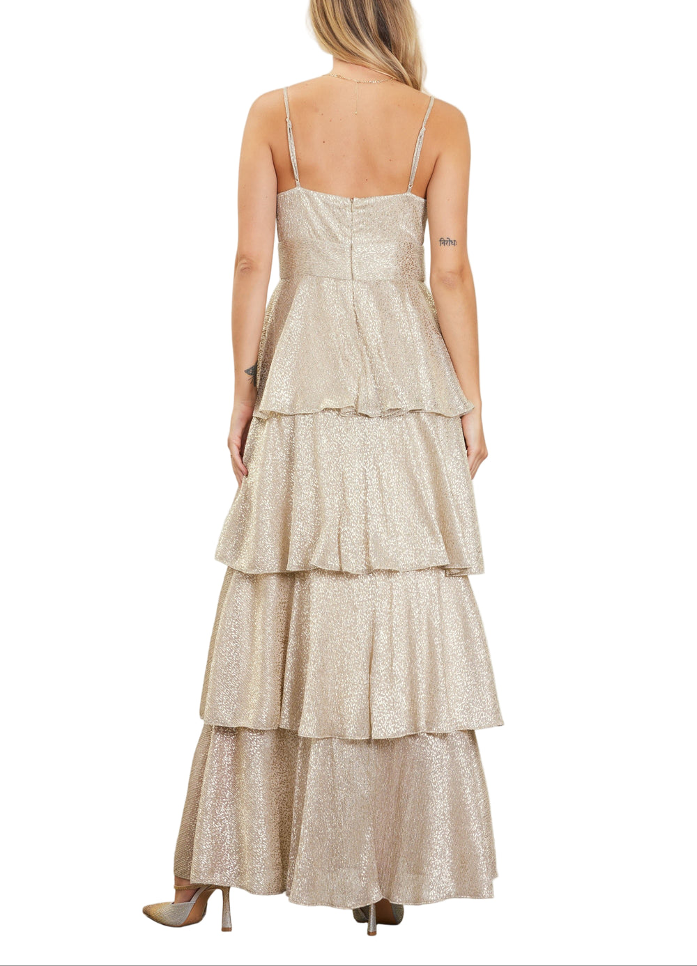 Shine bright in the Alicia Lurex Tiered Maxi Dress, where shimmering gold lurex fabric meets flowing layers for a dazzling look. Perfect for twirling at parties or making an entrance, this dress combines sparkle and movement to keep you feeling festive and fabulous all night long.