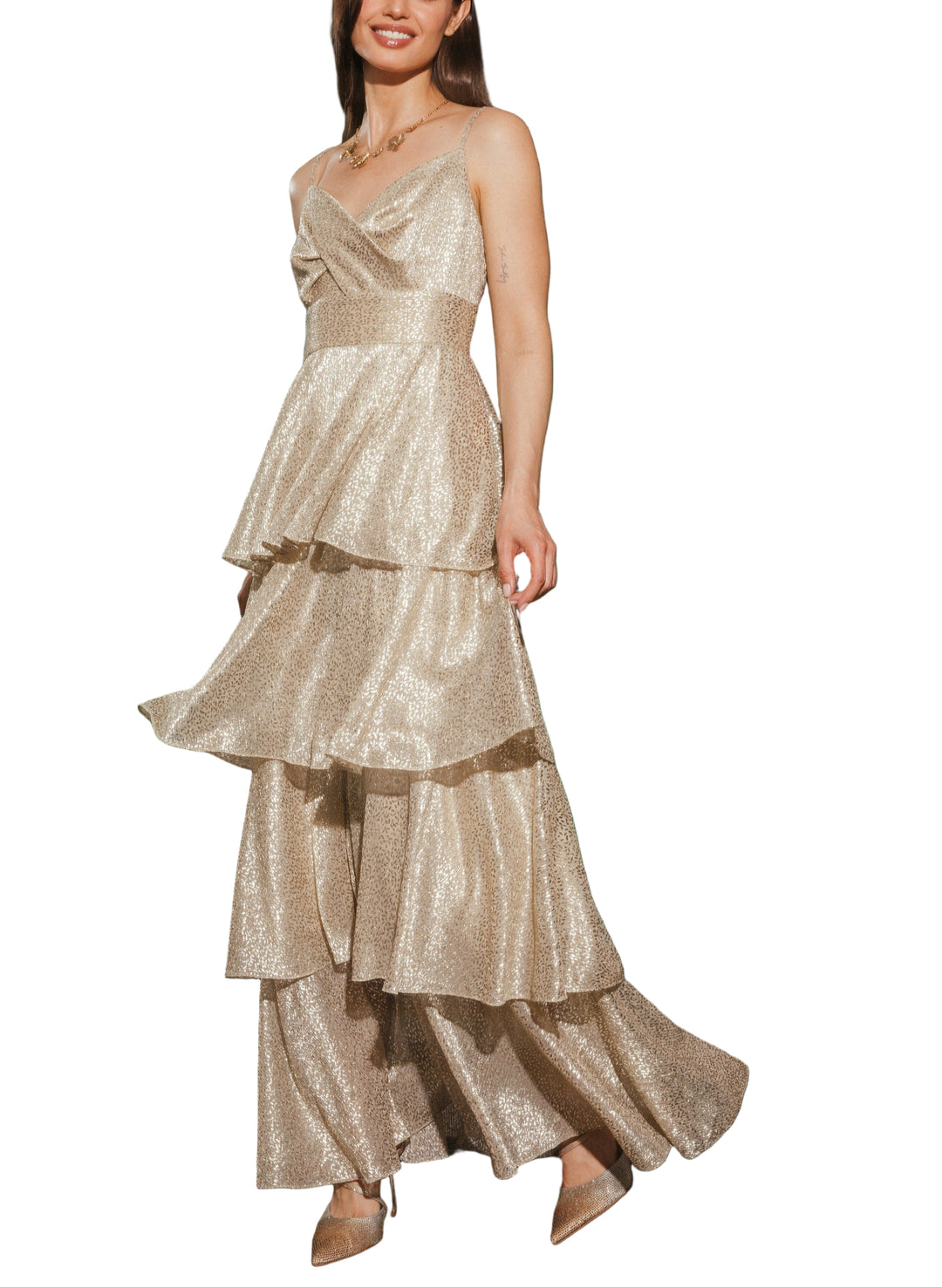 Shine bright in the Alicia Lurex Tiered Maxi Dress, where shimmering gold lurex fabric meets flowing layers for a dazzling look. Perfect for twirling at parties or making an entrance, this dress combines sparkle and movement to keep you feeling festive and fabulous all night long.