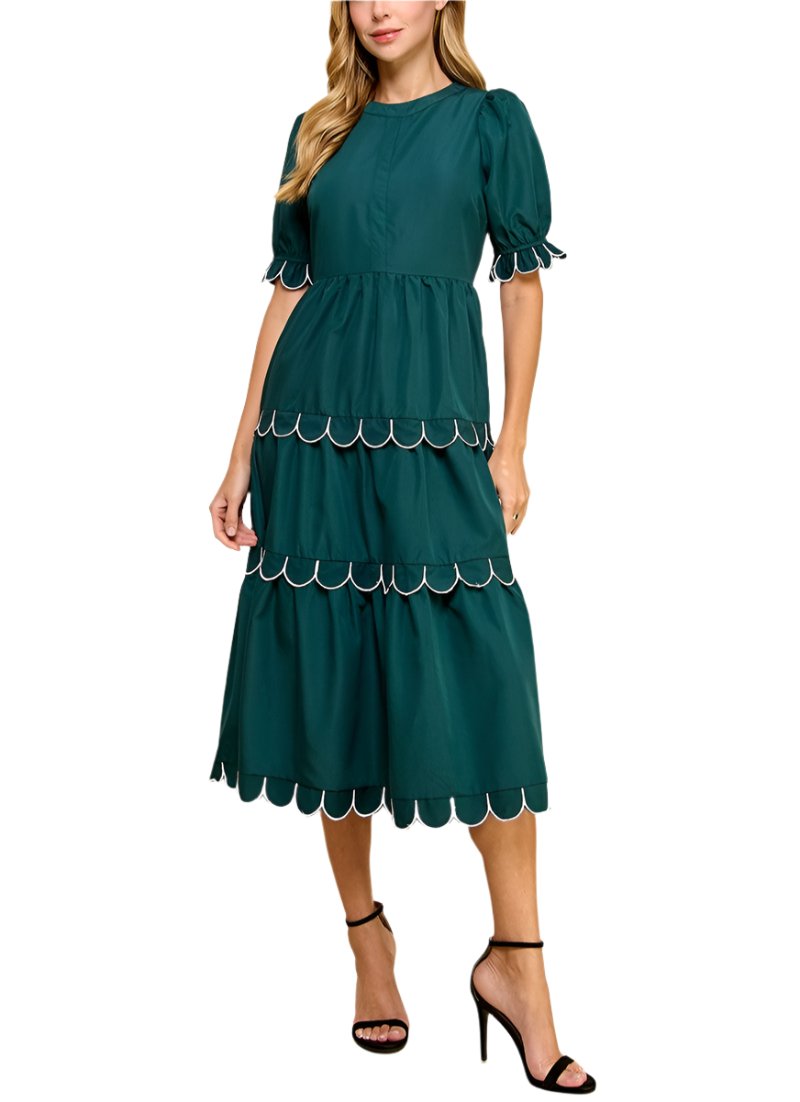 Solid midi dress with short puff sleeves and accented scallop trim along skirt and sleeve opening. Back concealed zipper closures.