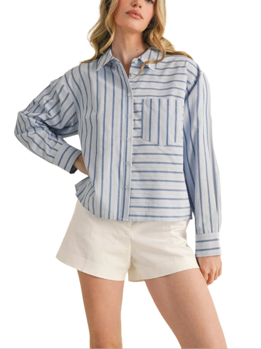 + Striped collared button down top
+ Collar with button down placket
+ Front patch pocket
+ Long sleeves with buttoned cuffs
+ Waist length oversized fit