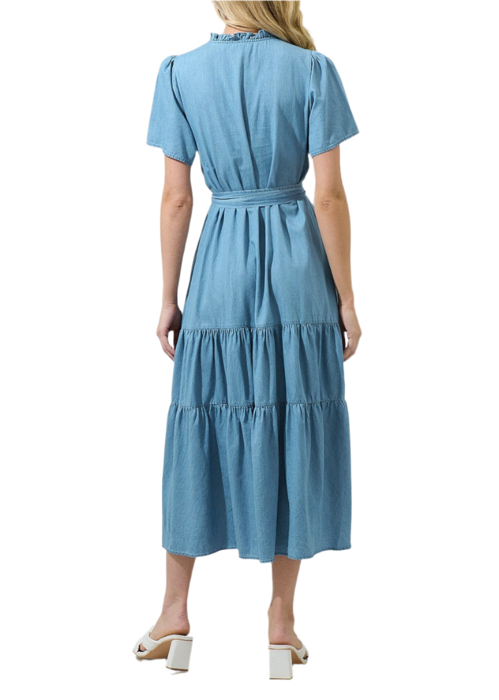 A must-have staple for your wardrobe, this Skylah Denim Britt Poplin Tiered Midi Dress. This midi dress has short sleeves that frame a split neckline with ruffles around and a lower button up detail. It has belt around the waist. You can easily style it with any heels. 