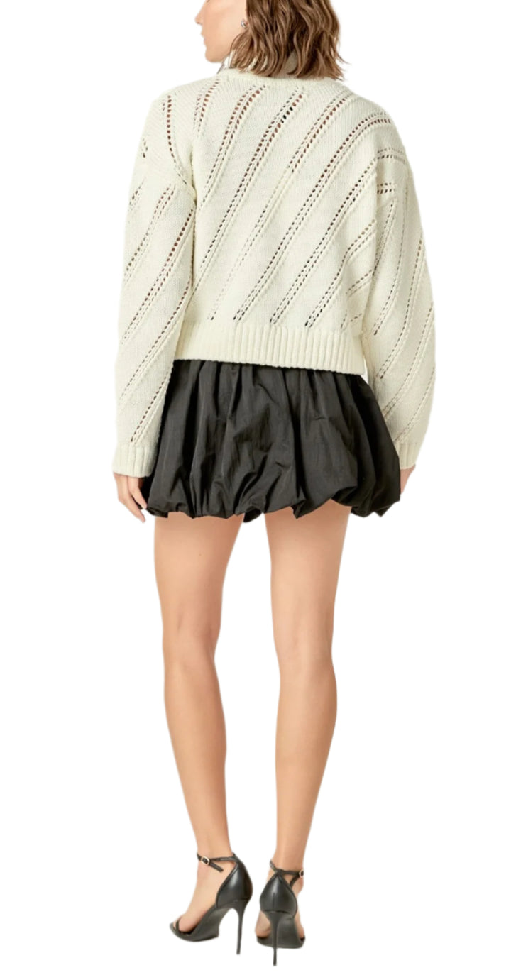 - Front zipper closure
- Long sleeve
- Cropped 
- Pullover

Total length: 19.5", Bust: 38.5"
Show More
Fabric Contents
- Shell: 65% Acrylic 35%Polyester
- Exclusive of Elastic