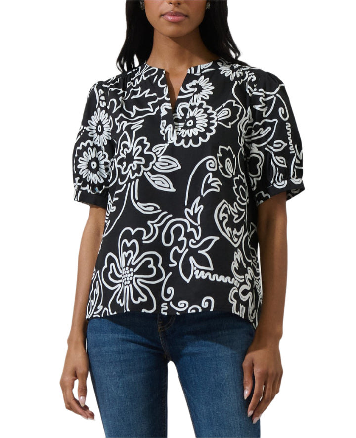 Prepare to collect compliments all day long with this flattering top. A classic top that has short puff sleeves followed by a split neckline that forms into V-neck. Pair with skinny jeans and ankle boots for a look that's both casual and polished.