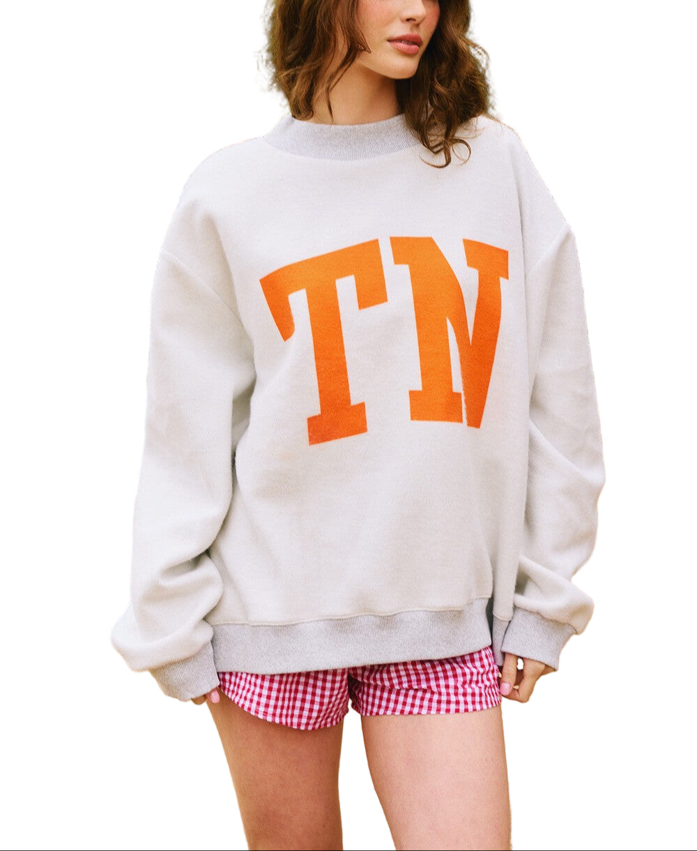 Get ready to flip your style with the Tennessee Reversible Crewneck! This cozy piece lets you switch up your look in a snap-two great designs for double the fun.

50% Cotton 50% Polyester