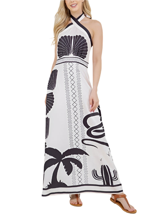 Unleash your inner beach goddess with the Hannah Halter Neck Maxi Dress. This tropical dress features a halter neck for a touch of sophistication, while the flowy silhouette is perfect for a day at the beach or a night out.&nbsp;