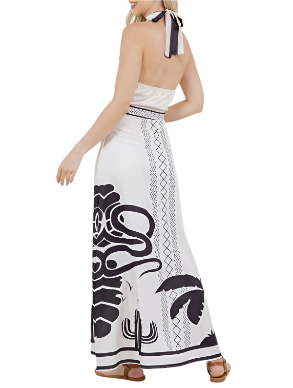 Unleash your inner beach goddess with the Hannah Halter Neck Maxi Dress. This tropical dress features a halter neck for a touch of sophistication, while the flowy silhouette is perfect for a day at the beach or a night out.&nbsp;