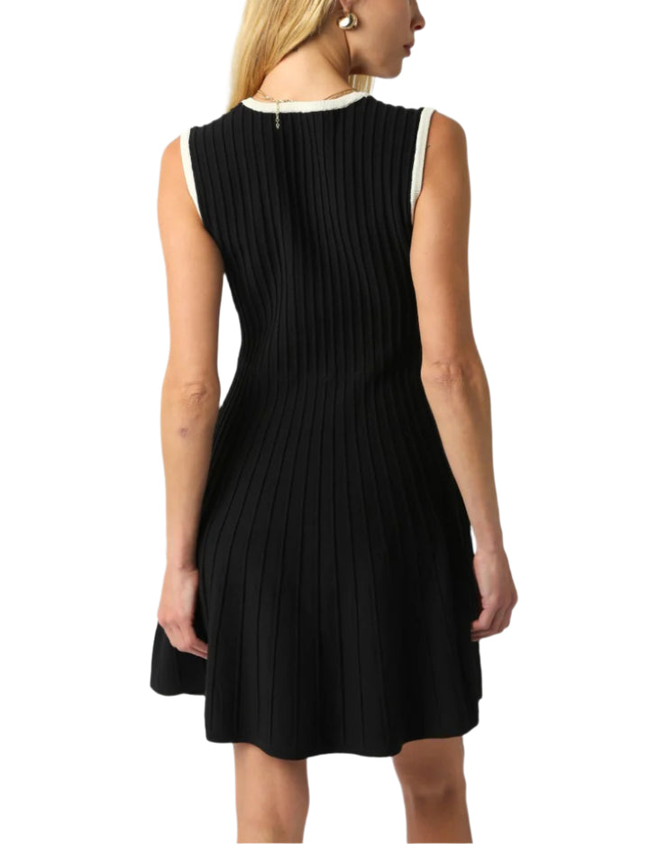Our Noma Line Dress features a square neck and an A line shape.
