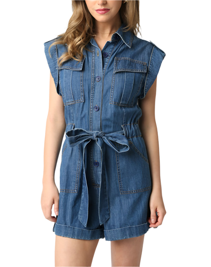Our Dasha Denim Romper features a belted detail and a rolled up hem.