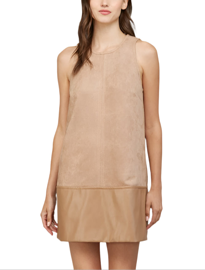 Step out in style with the Cheryl Faux Leather Suede Shift Dress in Camel. This playful blend of smooth faux leather and soft suede creates a chic contrast that’s sure to turn heads. Its relaxed shift silhouette offers comfort while keeping your look effortlessly cool.