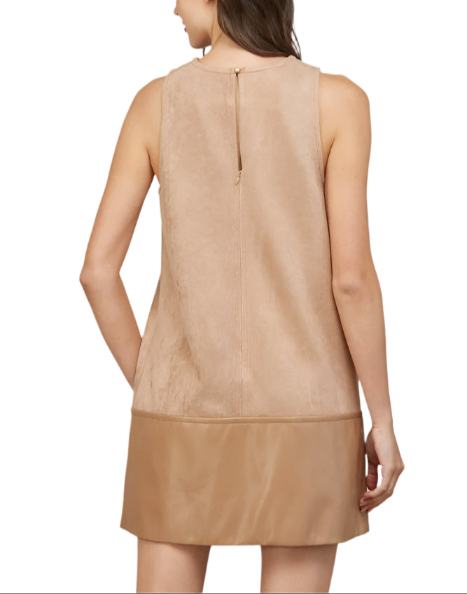 Step out in style with the Cheryl Faux Leather Suede Shift Dress in Camel. This playful blend of smooth faux leather and soft suede creates a chic contrast that’s sure to turn heads. Its relaxed shift silhouette offers comfort while keeping your look effortlessly cool.