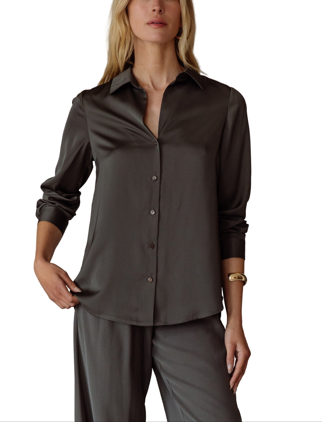 Elevate your style with the Annie Satin Blouse—a silky, long-sleeve delight that feels like a dream on your skin. Its smooth satin finish catches the light just right.