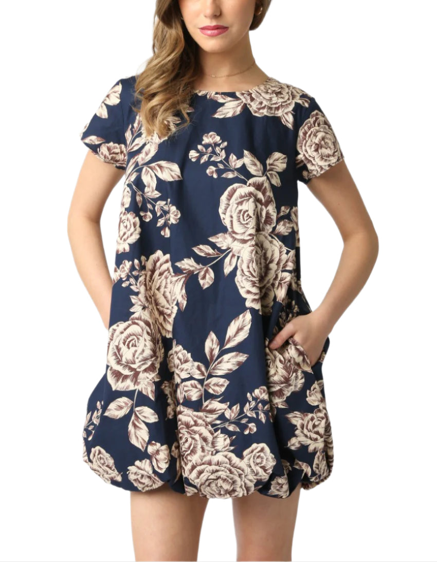 Our Charlie Floral Bubble Dress features a round neck and a bubble hem.