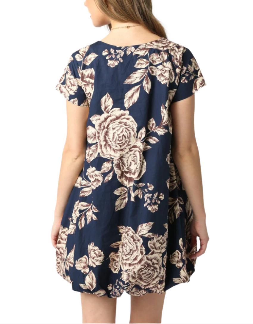 Our Charlie Floral Bubble Dress features a round neck and a bubble hem.