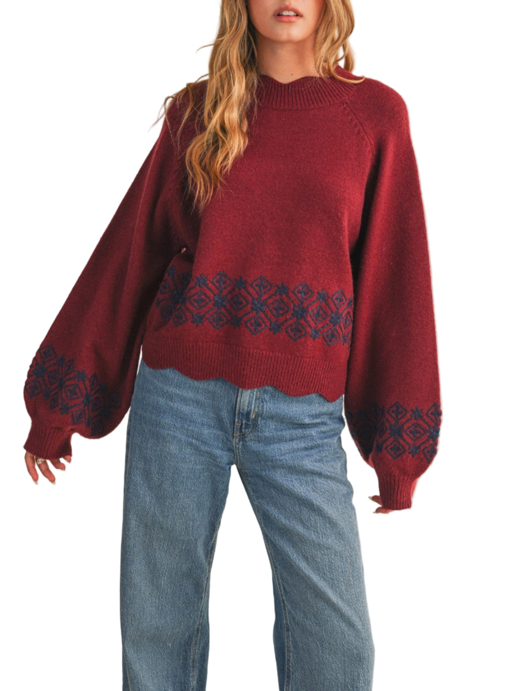 Scalloped mock neck sweater with embroidery
Scalloped mock neckline
Raglan seam long puff sleeves
Relaxed fit pullover
Embroidery detail on front and sleeves&nbsp;
Scalloped hem
Ribbed neckline, cuffs, and hem